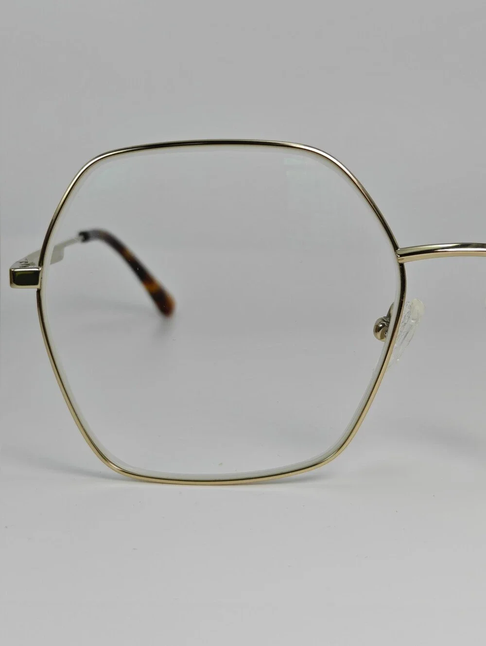 Elixir. Titanium.Gold Polygon. Metal Frame Women's Eyewear.